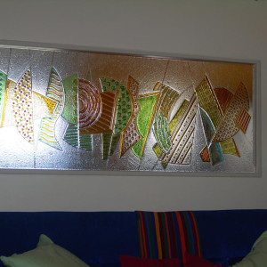 Un mur de verre entre cuisine et salon, pour gagner en lumière