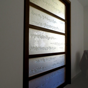 porte coulissante
en verre et bois